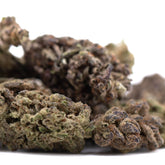 Mature rna cbd hemp flower with dense resinous trichomes and green brown purple hues featuring minor cannabinoids