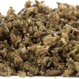 A pile of rna cbd hemp flower trim with green brown and beige hues showcasing its terpene profile and full-term quality