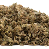 A pile of rna cbd hemp flower trim with dried buds showing green brown and beige hues and terpene profile