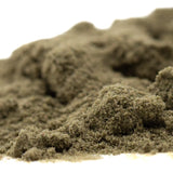 A mound of olive-green thca kief kinetic sand with fine texture for sour apple sour diesel legendary genetics wholesale