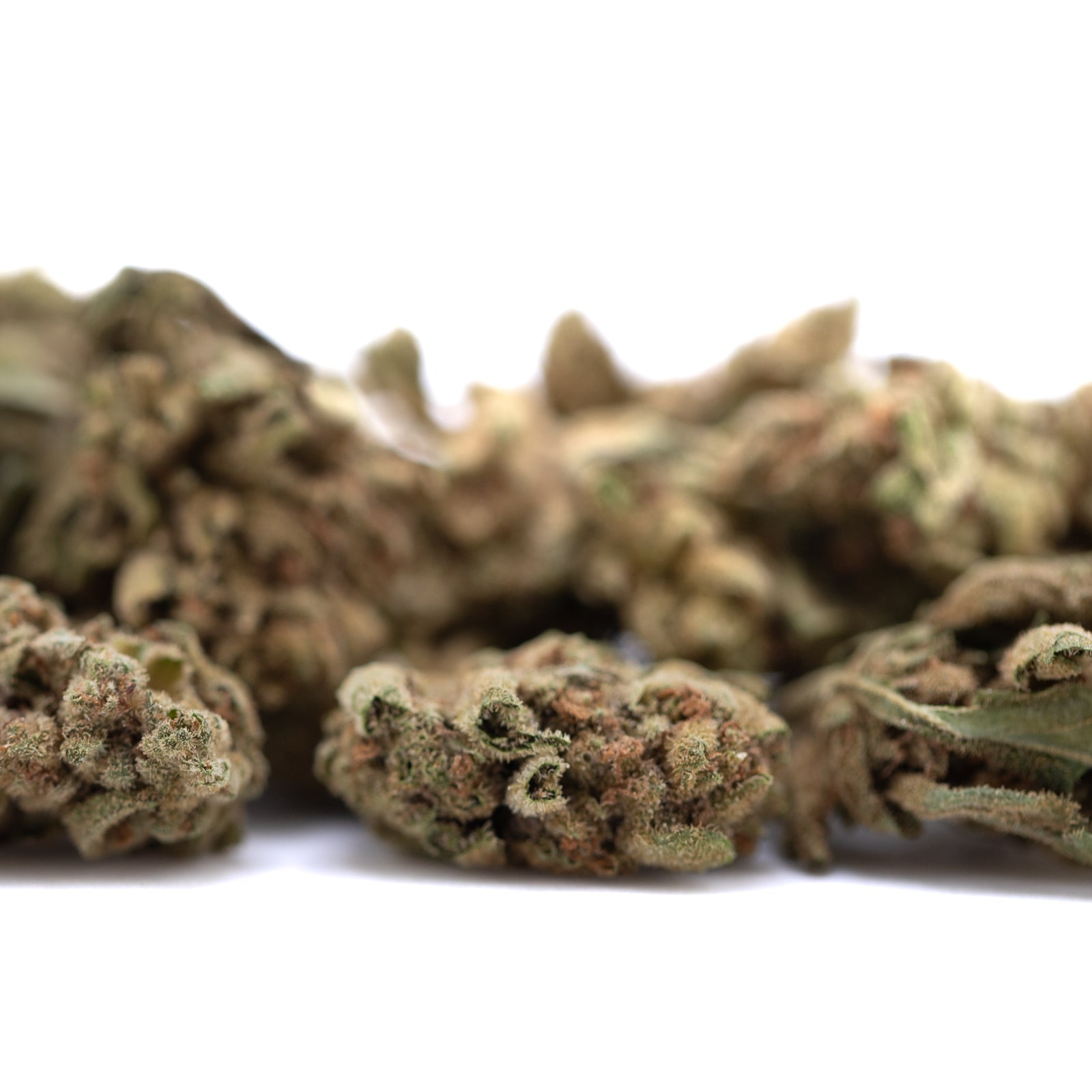 Sour Diesel THCa Smalls: Dense green-brown buds with resin glands