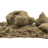 Star Krunch THCA Kief showing light brown sandy hemp flower material with clumps