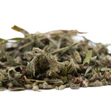 A pile of dried greenish-gray sage leaves with fuzzy texture for strawberry cheesecake thca trim wholesale premium flower