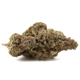 Super Runtz THCa hemp flower bud with green, purple hues and white trichomes