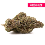 Super Runtz THCa hemp flower: green bud with white trichomes and purple hues
