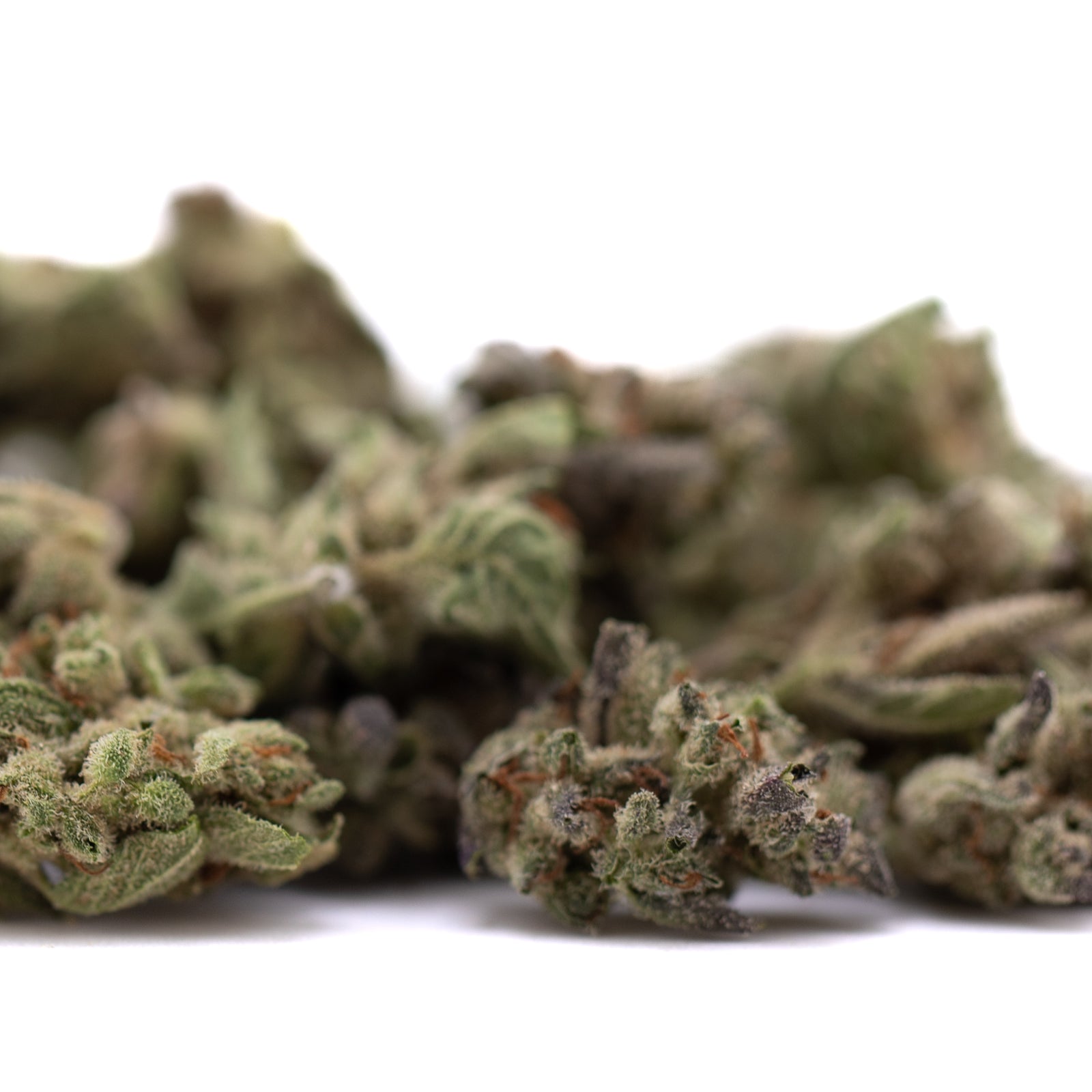 Premium Top Gun THCa Flower Smalls: Green buds with trichomes and resin