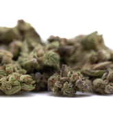 Premium Top Gun THCa Flower Smalls: Green buds with trichomes and resin