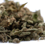 A pile of tricross full-term thca dried cannabis buds in green brown and beige hues with fine trichomes for thca shake
