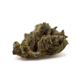 A dense green turtle taffy thca flower smalls hemp bud with fine trichomes and subtle purple hints