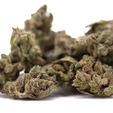 Green and brown frosty turtle taffy thca flower smalls hemp flower buds with textured surface full-term