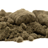 Brown textured flocking material resembling soil used in turtle taffy thca kief hemp flower product display