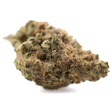 A dense irregular zonkers thca greenhouse small cannabis bud with green brown hues and fine trichomes, sour lemon lemony