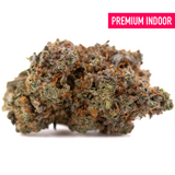 Dense Huckleberry Diesel THCA flower with orange hairs and frosty trichomes for sleep support