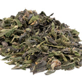 Dried green tea leaves from Oreoz THCa Indoor Trim Wholesale 1LB product display