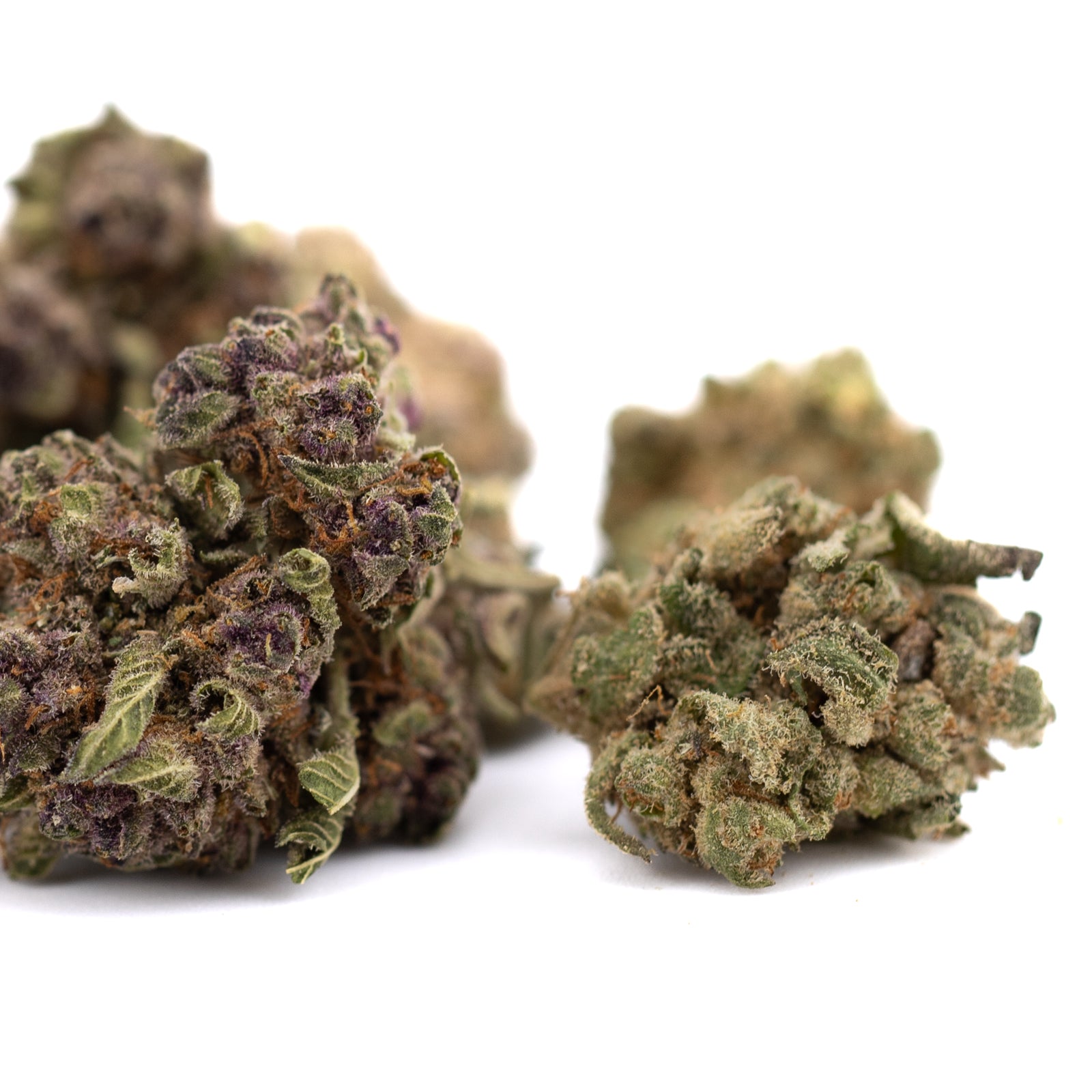 Dense purple-tinged Pineapple Express Indoor THCA Flower Smalls hemp flower