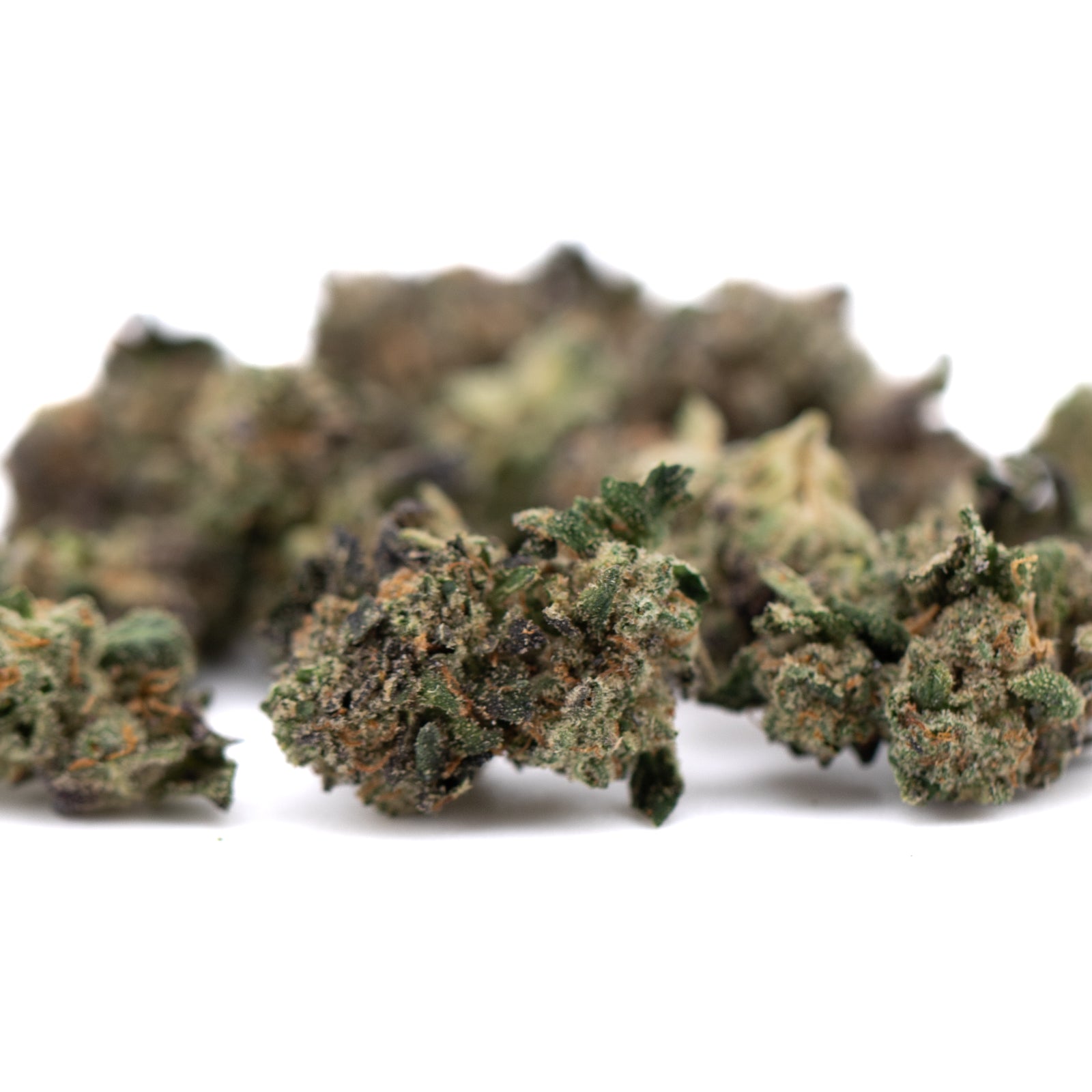 Pile of dried Purple Wedding Cake Indoor Flower Smalls hemp flower buds