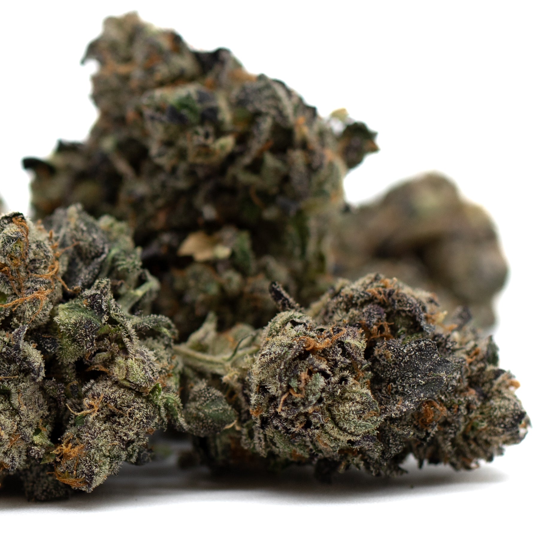 Purple Wedding Cake indoor THCa flower with dark green and purple cannabis buds