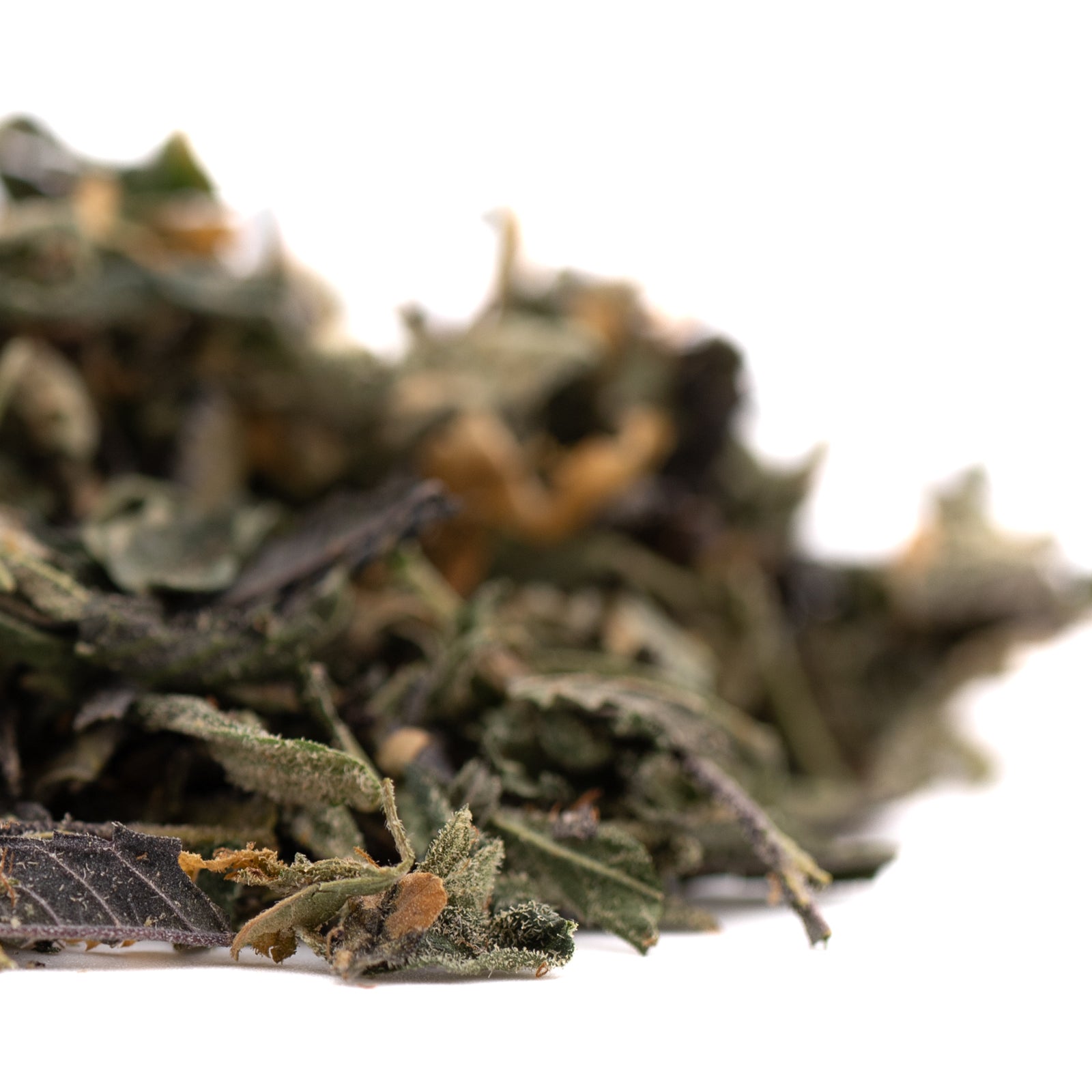 Dried green and brown herbs for Tropical Punch Indoor, THCA Trim, Northern Lights products