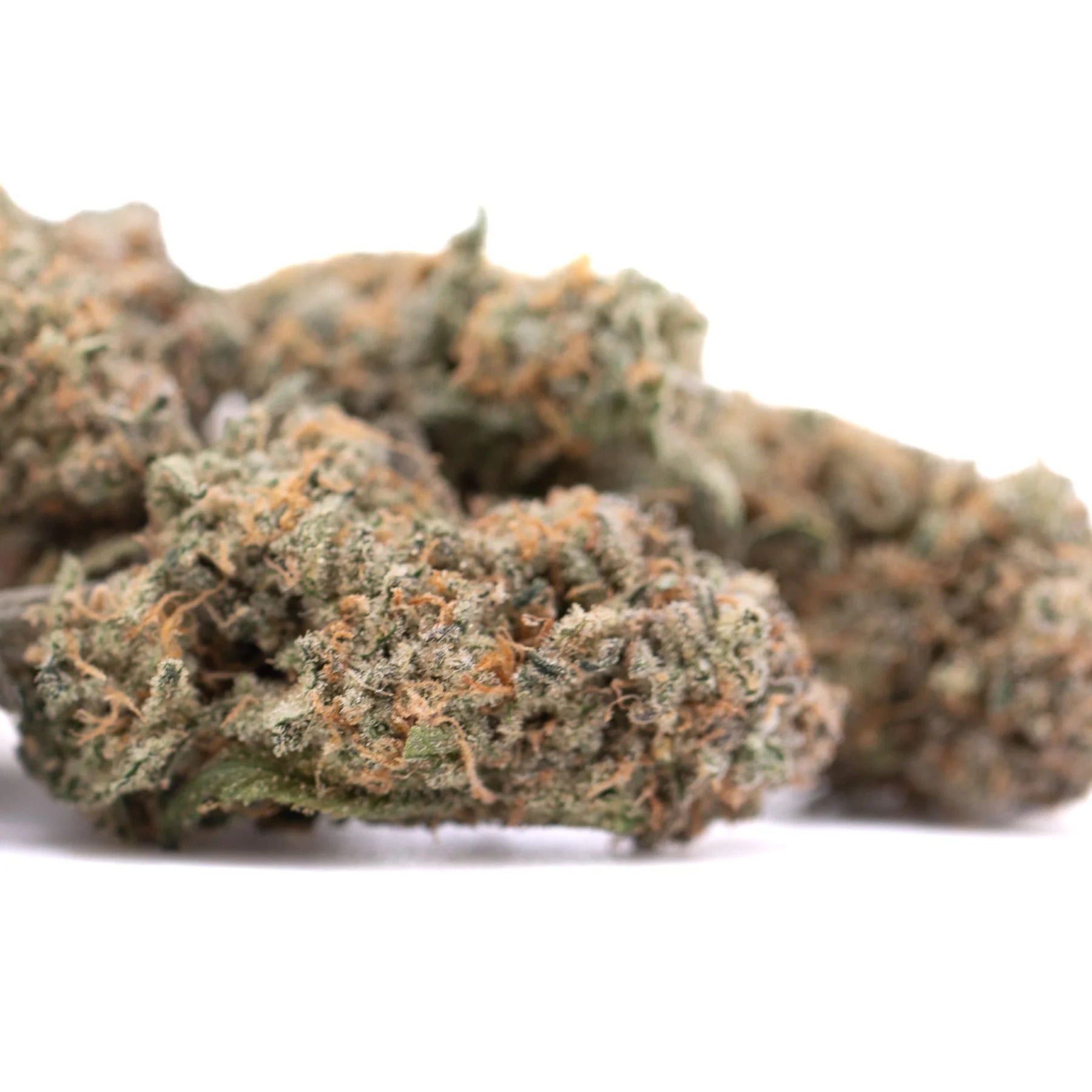 A dense green and orange-hued alaskan huckleberry diesel indoor cannabis bud with a textured surface