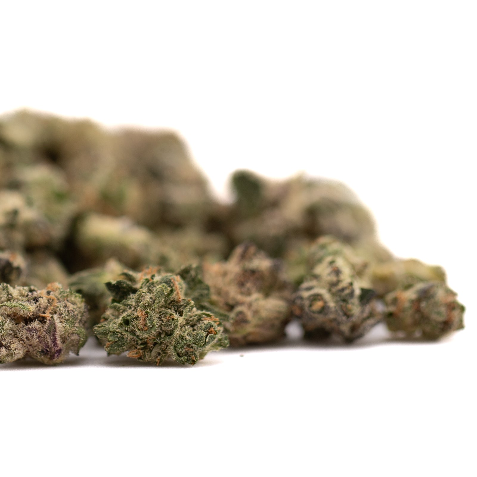 Pile of dried Astroboy Indoor THCA Flower Smalls small buds for premium cannabis experience