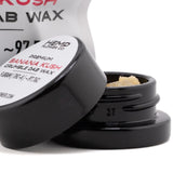 Black ceramic jar containing light amber banana kush thca crumble wax derived from hemp flower 5 gram jar