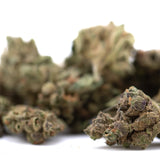 Green and purple banana og’s full-term thca hemp flower smalls with a frosty textured surface