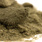 A mound of coarse green thca kief with a tropical character from the legendary banana strain for wholesale use