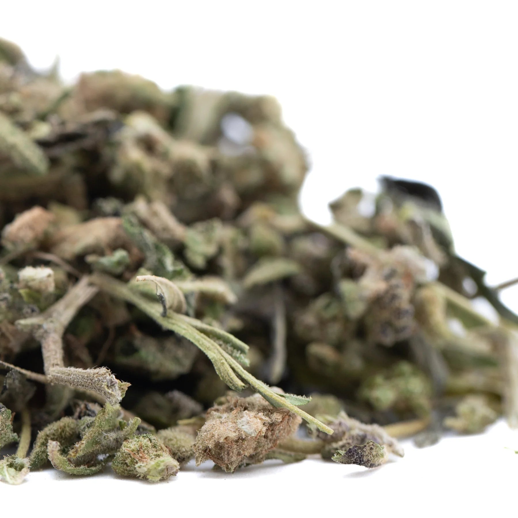 A pile of banjerine trim full-term thca with paradoxical citrus and boost x tangelo hues in green brown and gray tones