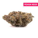 Blue Cookies THCa Indoor Flower: dense cannabis bud covered in trichomes for premium quality