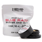 Black cylindrical container with white label holding premium blue raz thca budder wax from hemp flower co 5 gram