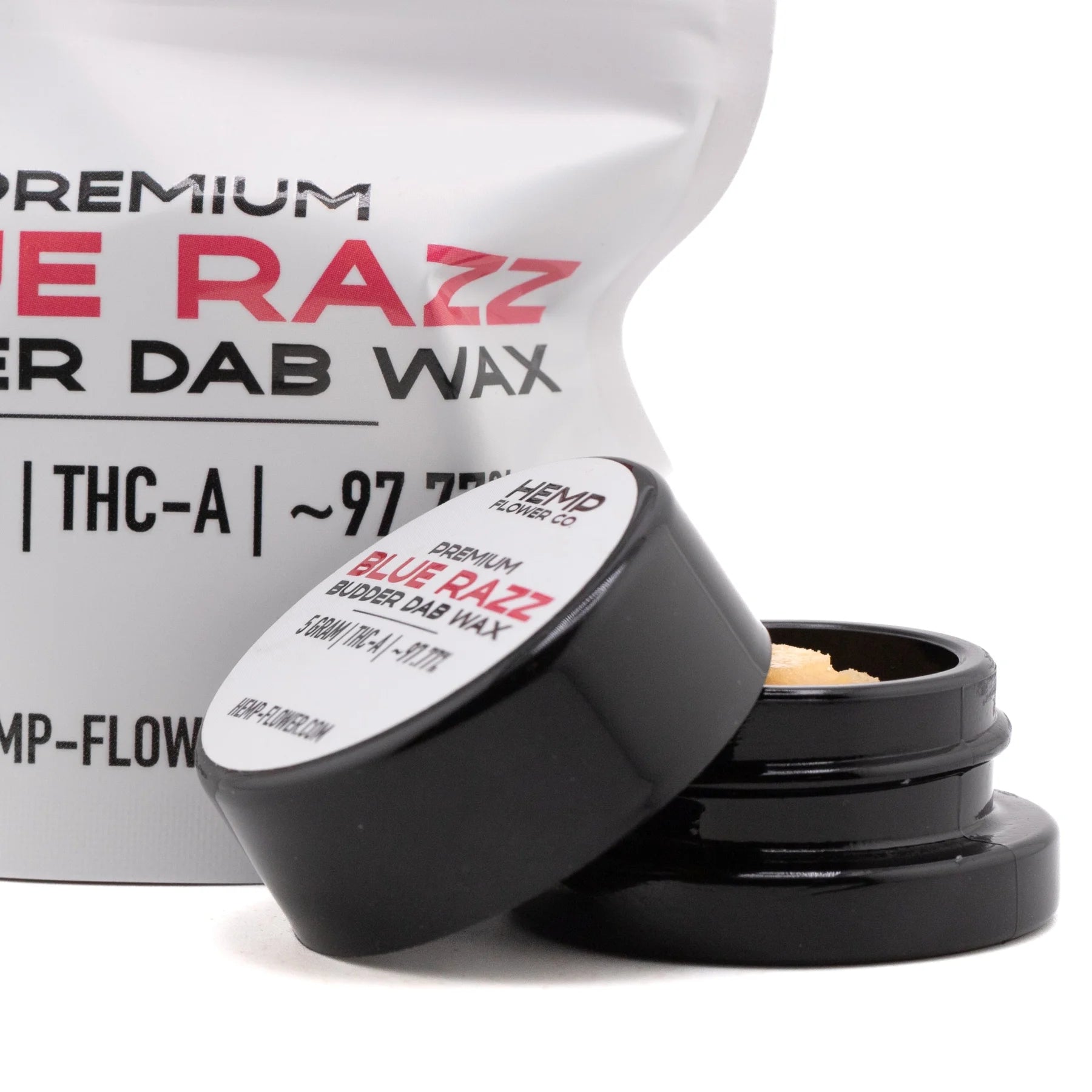 Black plastic jar of light-colored blue raz thca premium thca budder wax 5 gram container with white label and lid
