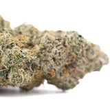 Blueberry Kush THCa flower: green orange bud with white trichomes, pure indica