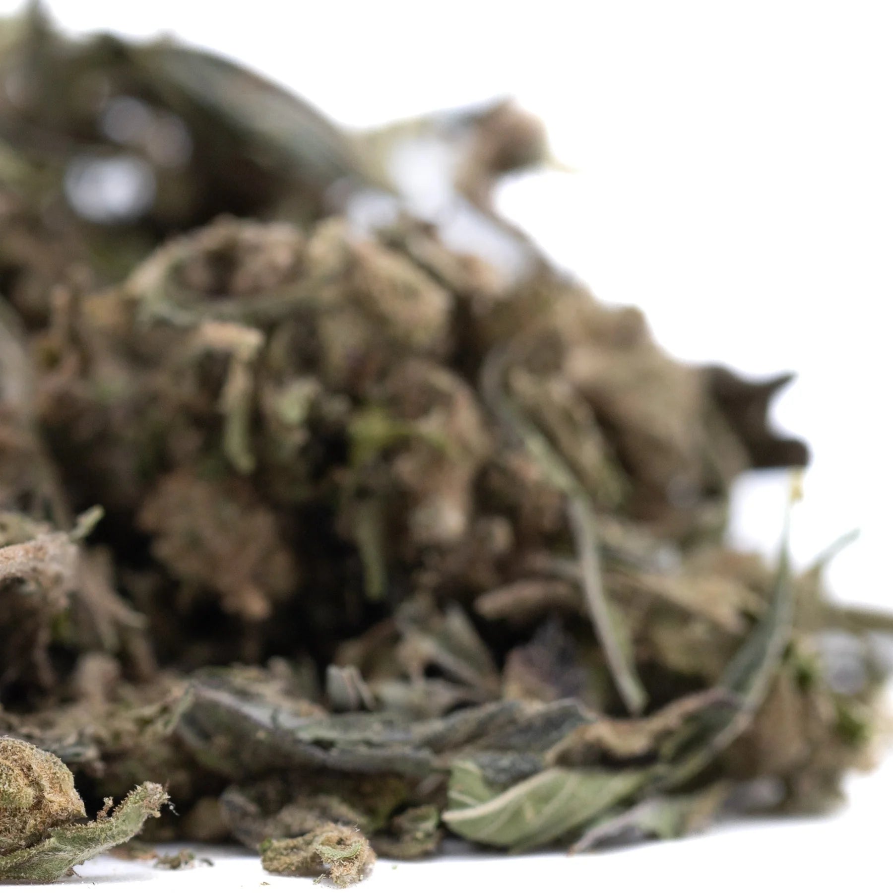 Dense dried blueberry muffin thca trim hemp flower bud with green and brown hues for wholesale use