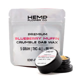 Black cylindrical container of blueberry muffin thca crumble wax by hemp flower co with 5 gram hemp flower product
