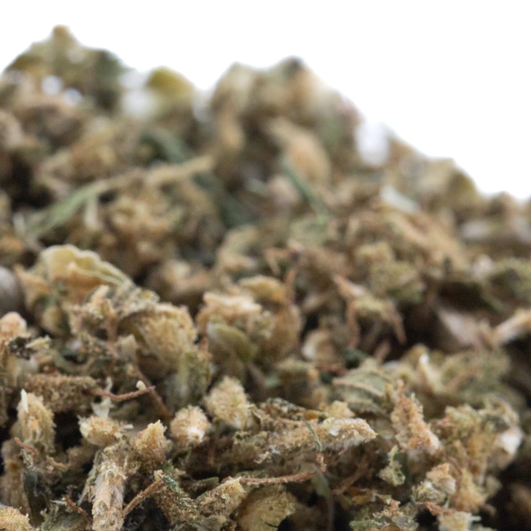 Dense textured hemp flower cbd trim with green and amber hues from indiana bubble gum full term trim