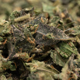 Close-up of chopped Cadillac Rainbow THCa indoor trim wholesale 1LB for sale