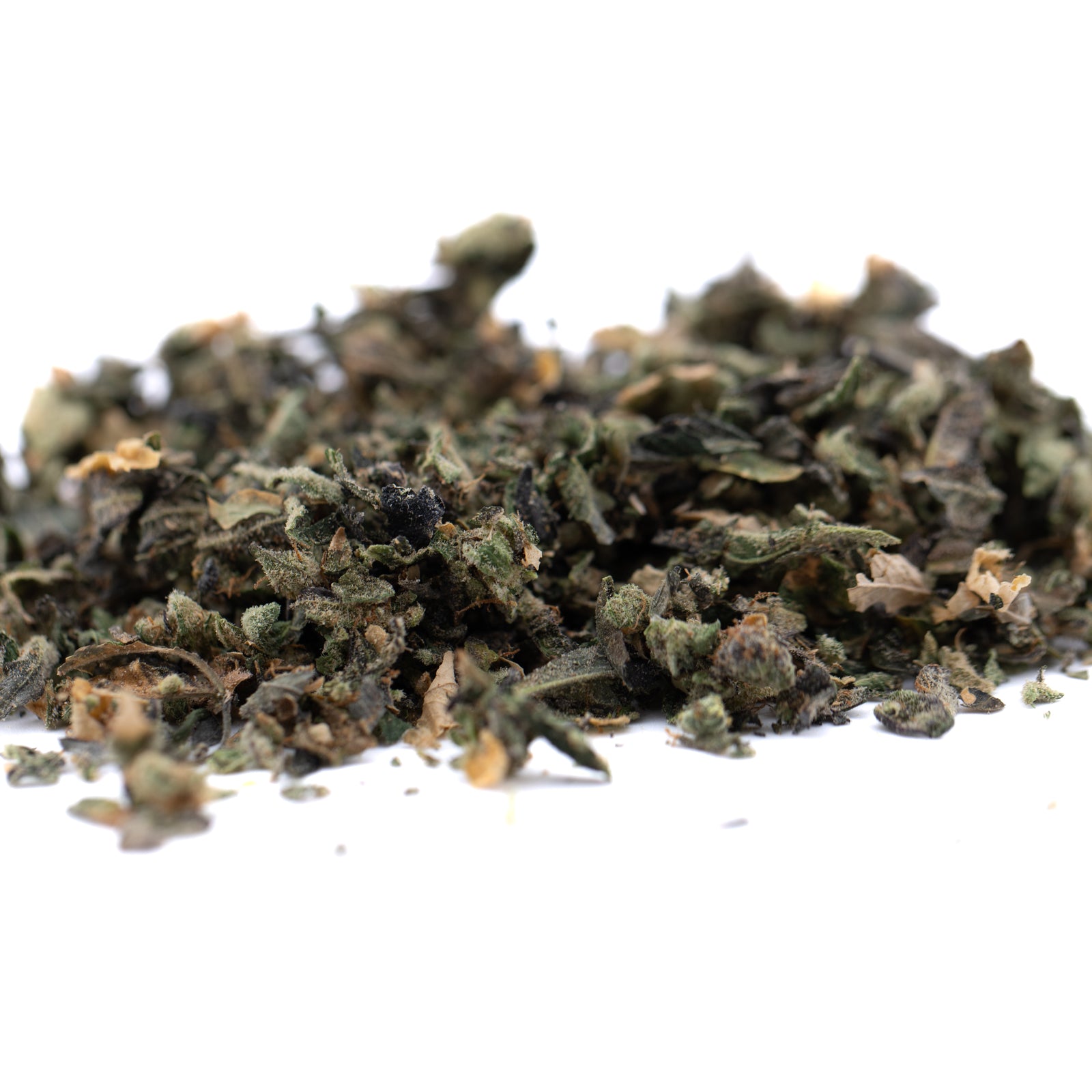 Dry crushed green herbs with brown flecks for Butter OG Indoor wholesale 1lb thca trim