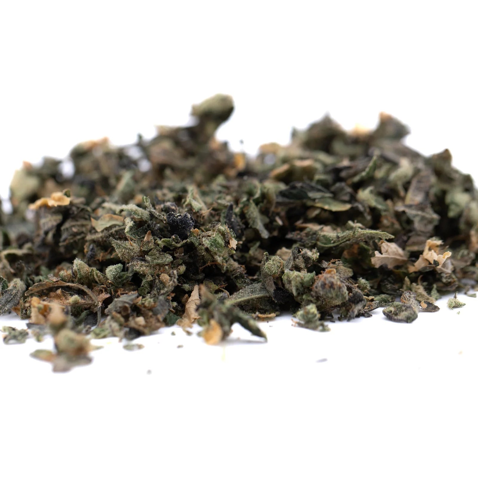 Dry crushed green herbs with brown flecks for Butter OG Indoor wholesale 1lb thca trim