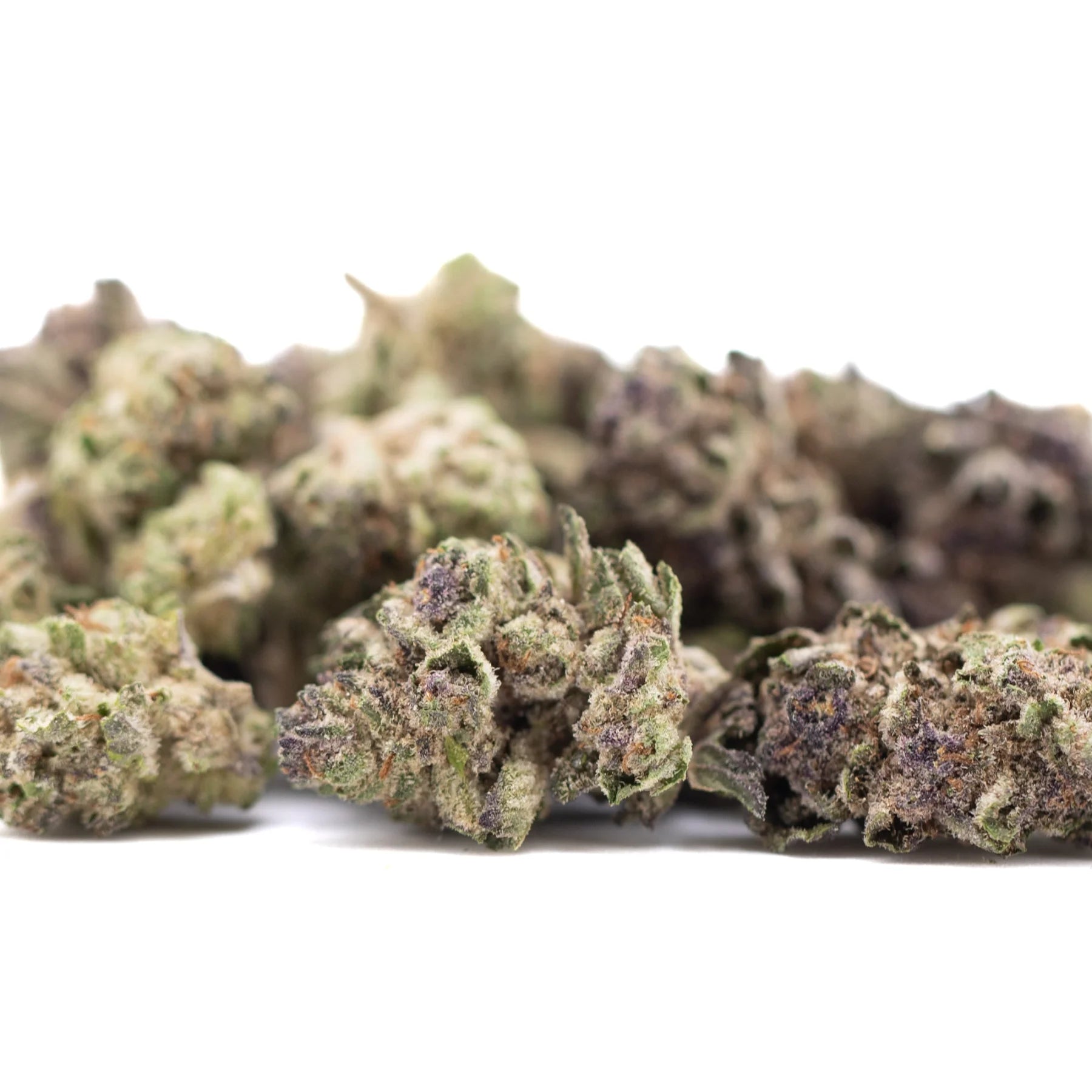 Lush dense cali burger thca greenhouse hemp flower smalls with green and purple hues covered in fine trichomes