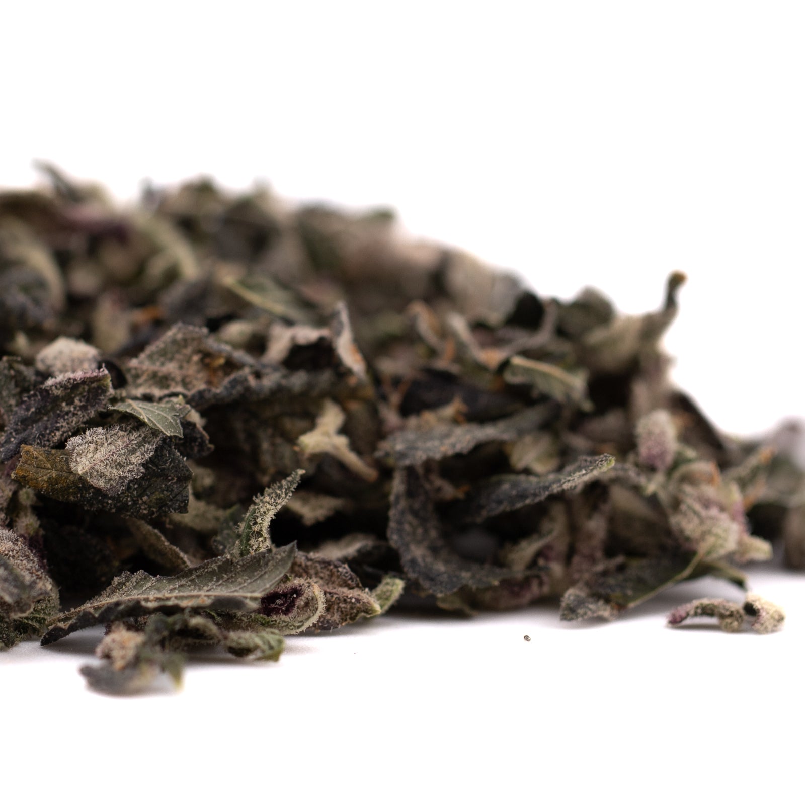 Dried green tea leaves in Candy Mac Indoor Trim Wholesale 1LB package, perfect for mac indoor trim and THCA trim