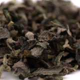 Dried dark green Candy Mac Indoor trim with frosted appearance for wholesale 1LB THCA trim