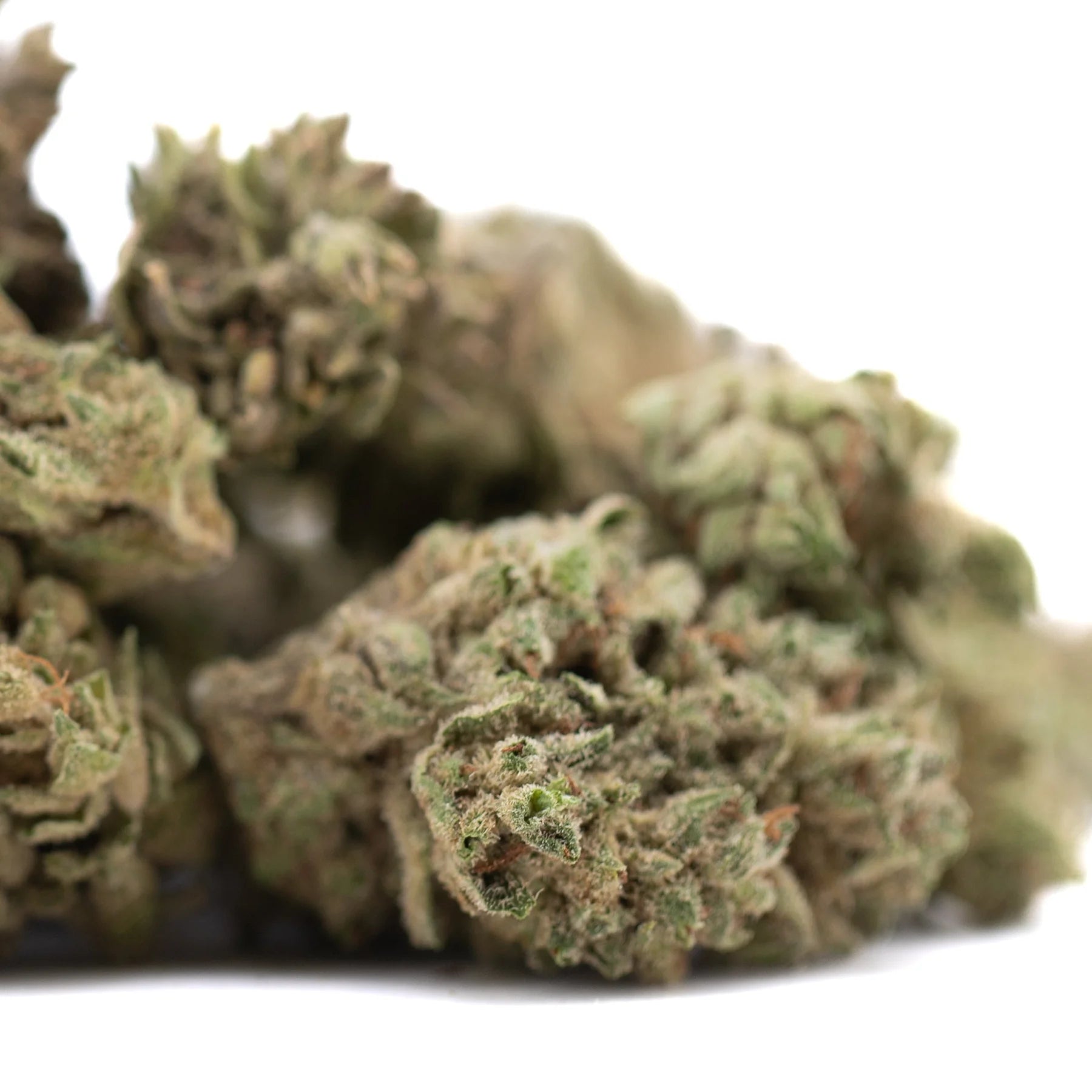 Cbg hemp flower #2 smalls featuring a dense green and brown cannabis bud with frosty white trichomes