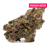 Dense purple and orange Cereal Milk Indoor THCa Flower covered in trichomes