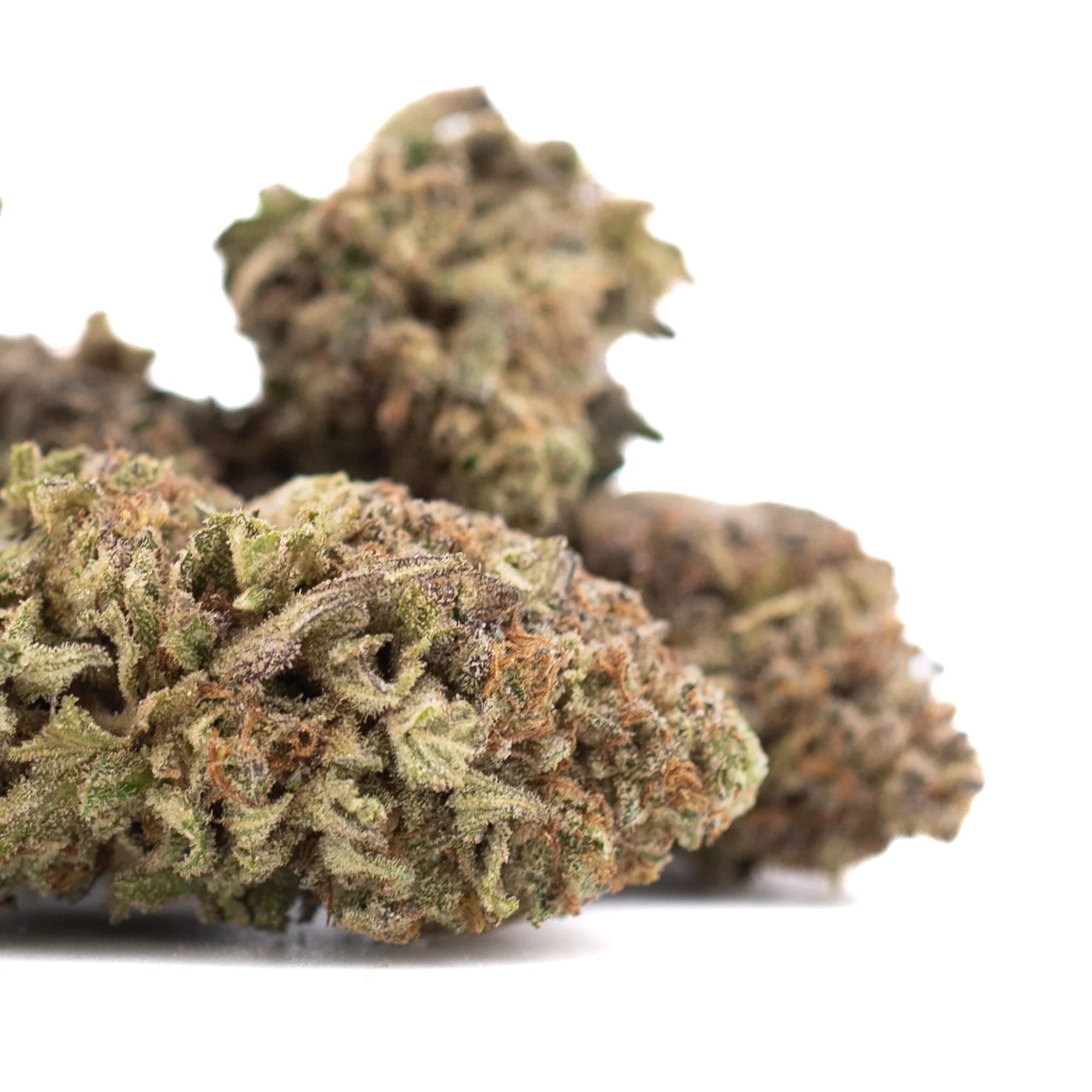 Green and brown cherry truffle greenhouse thca hemp flower buds with frosty texture and rich terpene profile