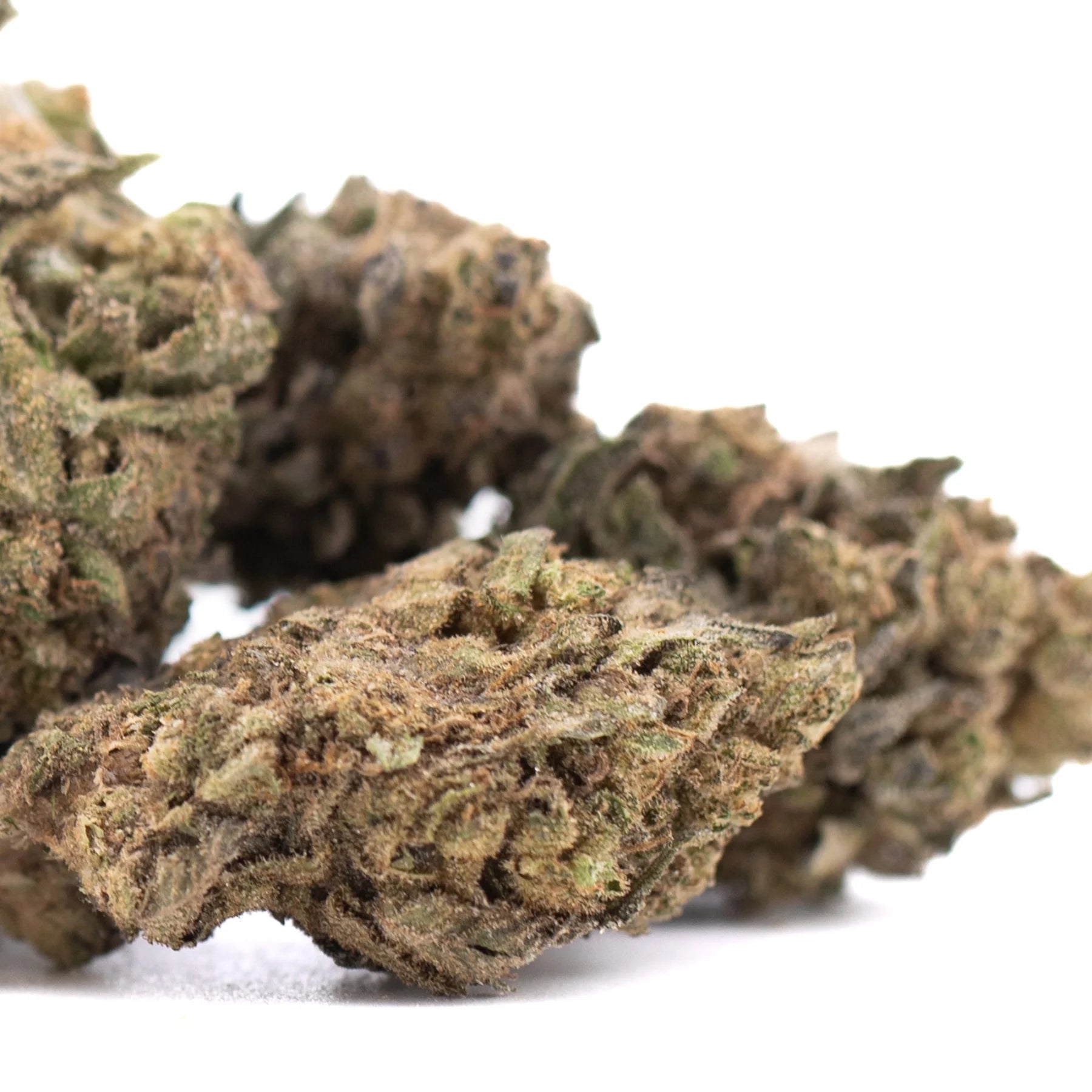 Dried cherry truffle thca hemp flower with dense green and brown buds from greenhouse wholesale batch
