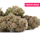 Premium indoor cultivation chicken and waffles thca flower with dense frosty green and orange trichomes for kush mints