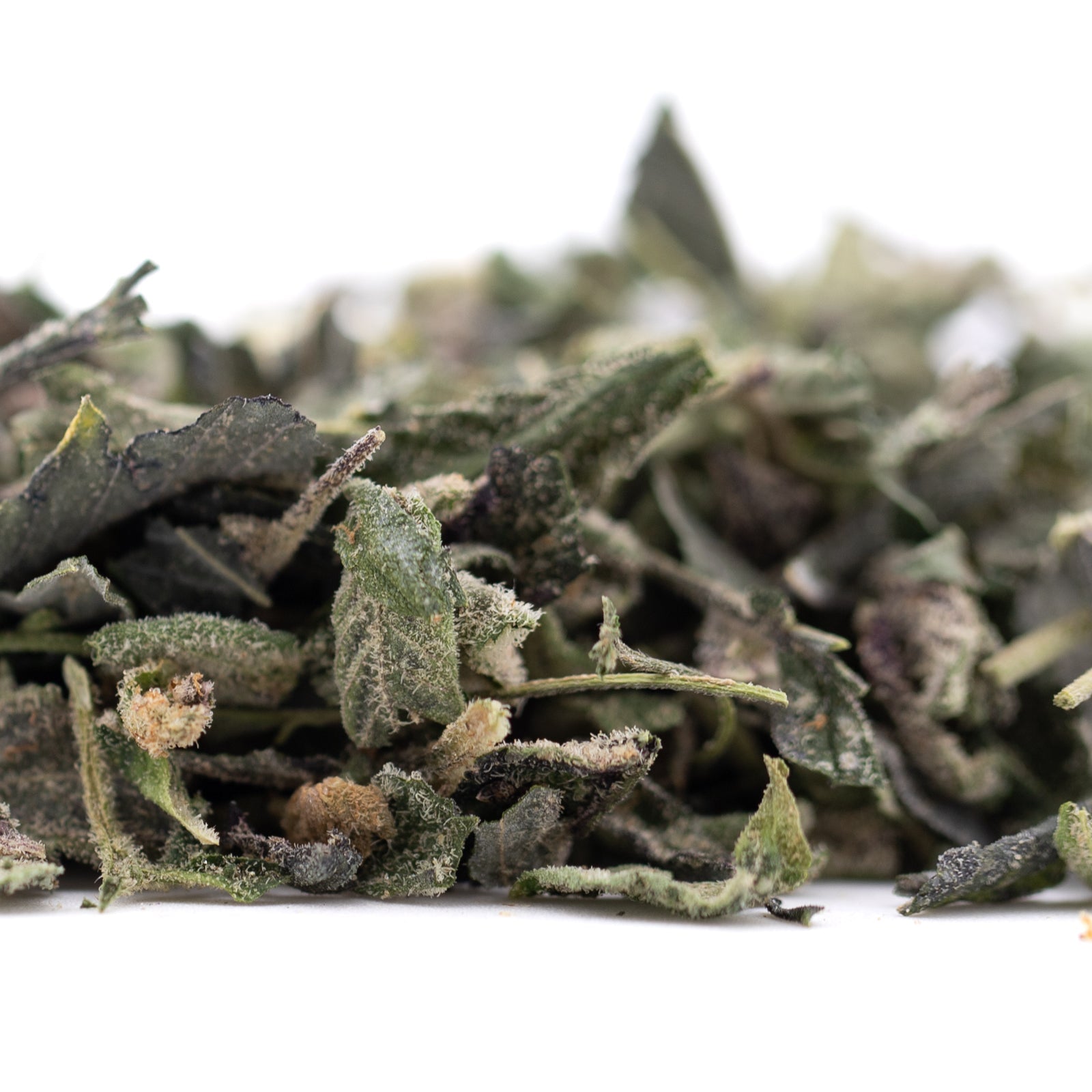 Dried sage green THCa trim wholesale hemp flower with curled edges