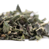 Cookies and Cream THCa Trim: Dried sage leaves in green-brown hemp flower blend