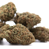Mature critical berries hemp flower with dense green and brown textured buds resembling bubba kush strain