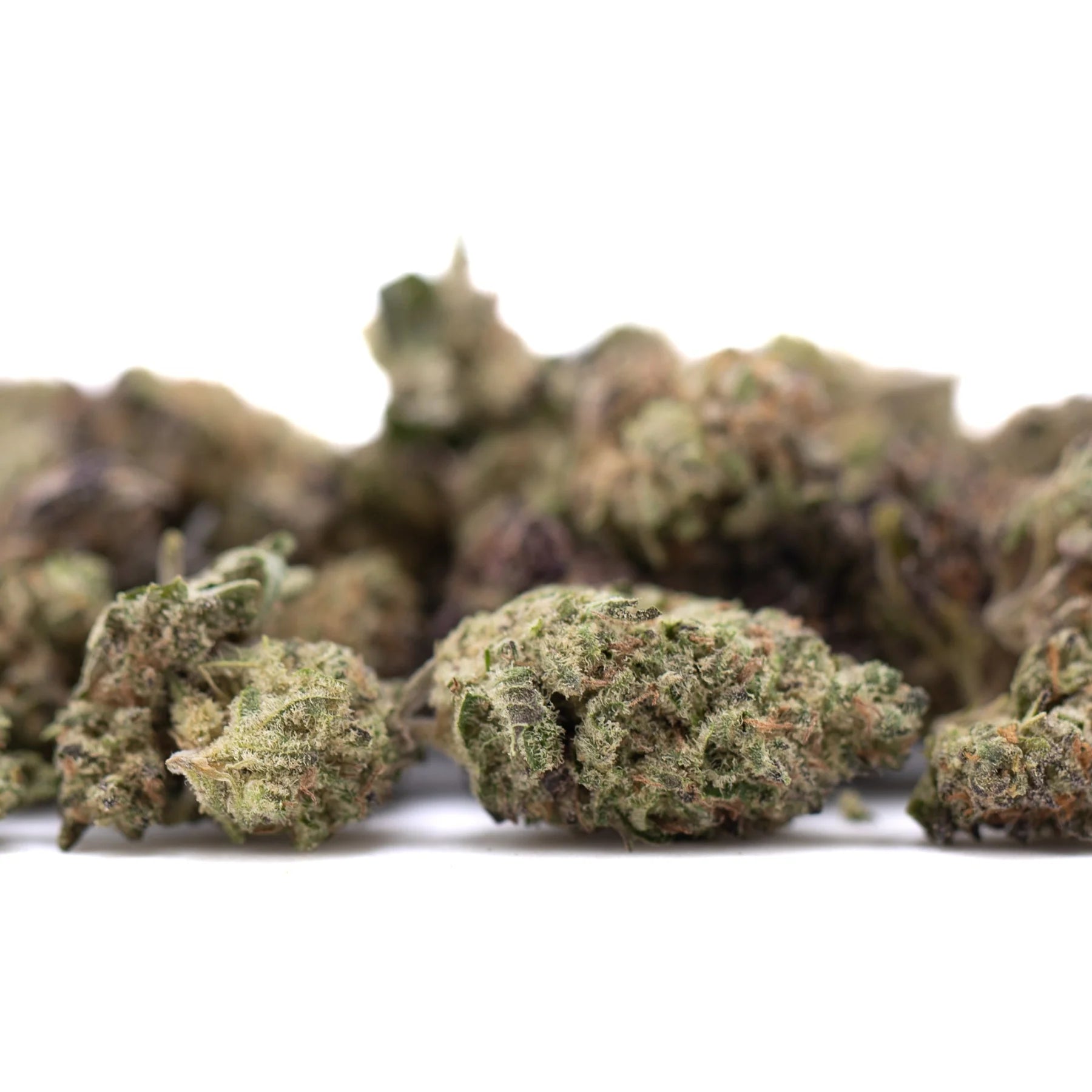 Green and purple greenhouse smalls hemp flower with frosty texture and high thca content from daily grape
